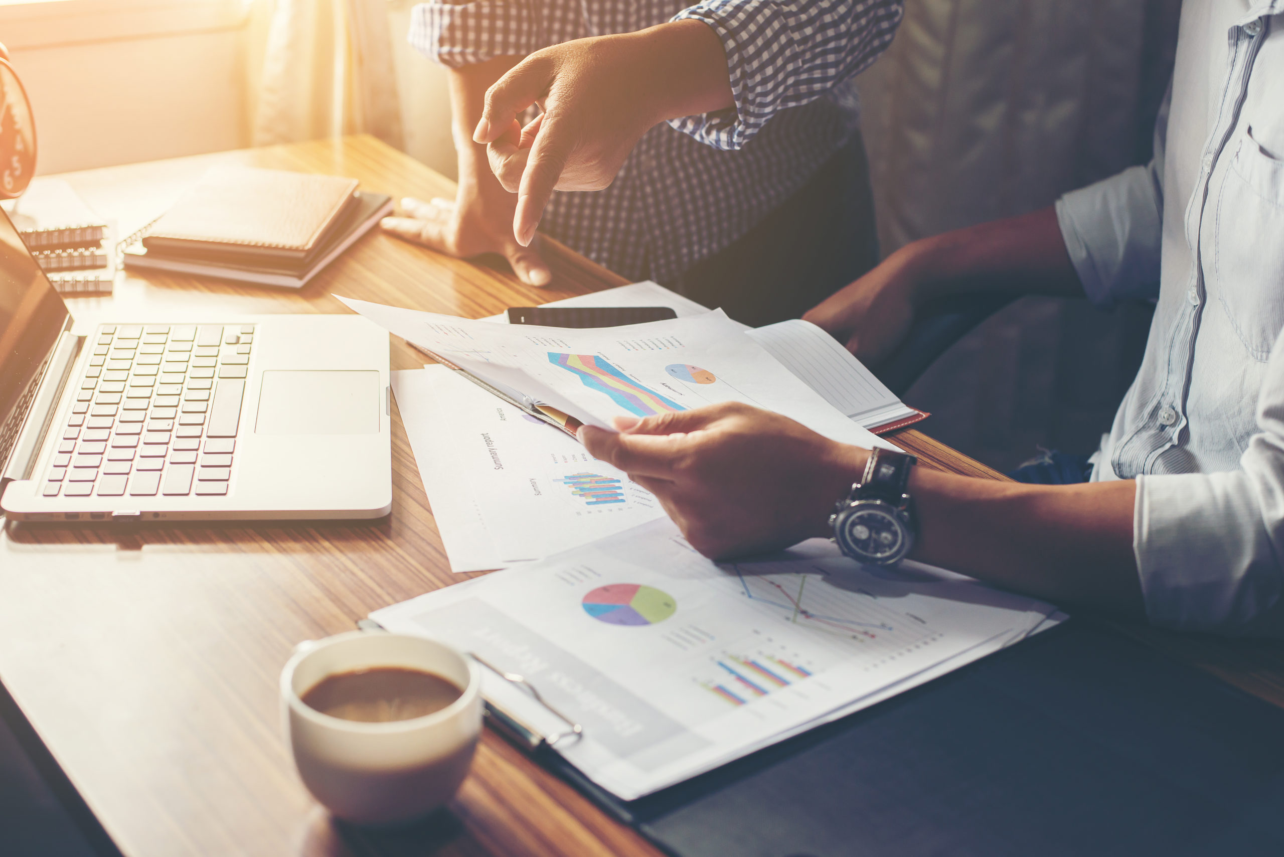Financial,accounting,investment advisor consulting with her team investment strategy